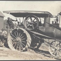 Judd Family:  Working on Steam Engine Tractor