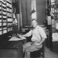 Post Office:  Ralph Hartman, Postmaster inside Sugar Grove Train Depot