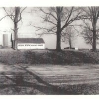 Roadside view of a Home and Farmstead